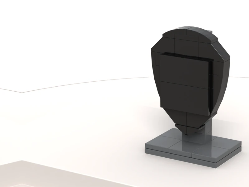 A render of the Fidget Shield built from LEGO® bricks, turned to show its front and right side.