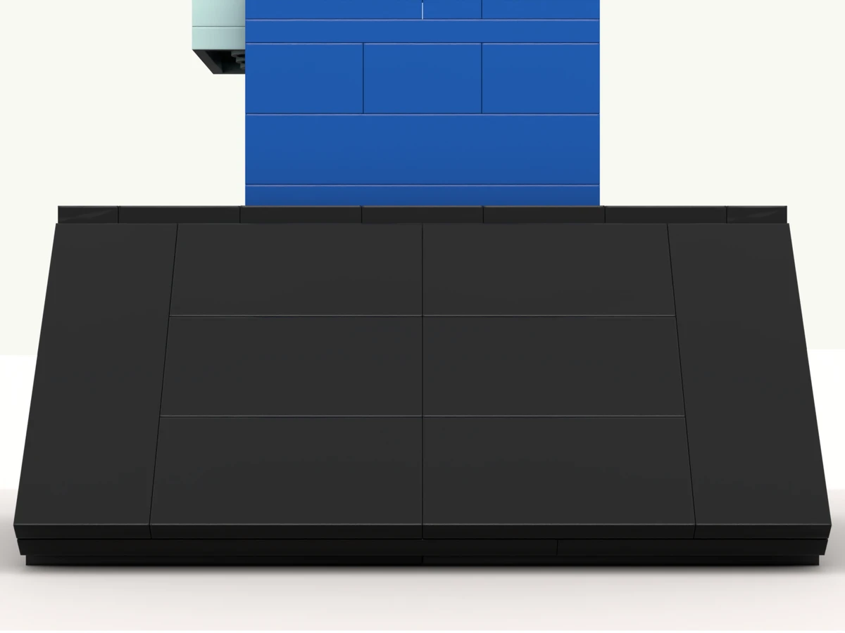 The blocks deal toy at rest on its turntable, front facing you