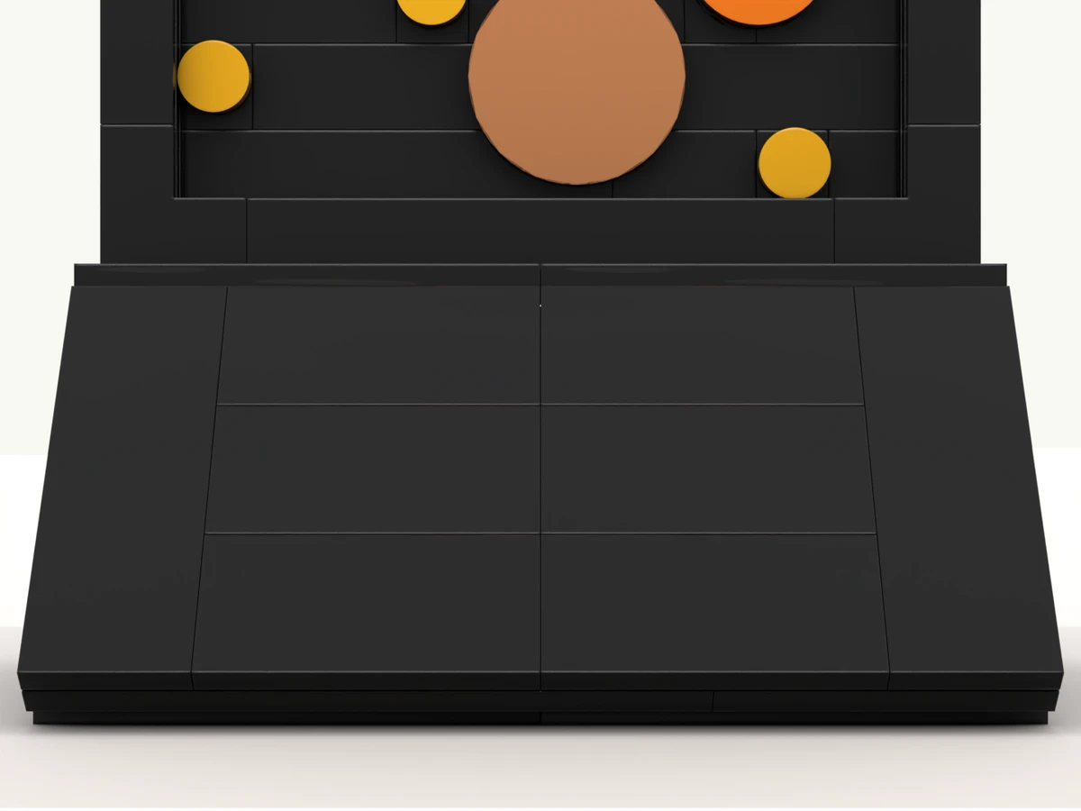 The circles deal toy at rest on its turntable, front facing you