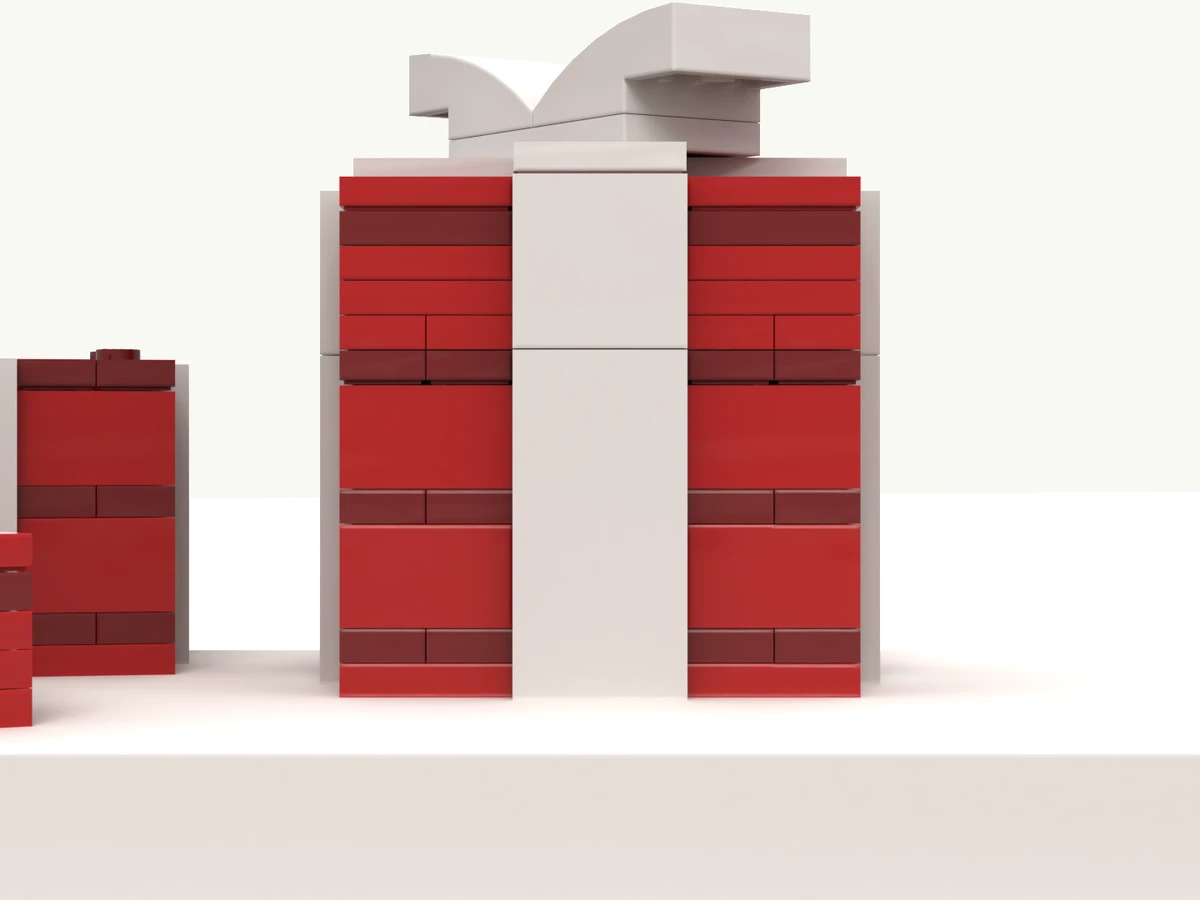 The gift box model at rest on its turntable, ribbon facing you