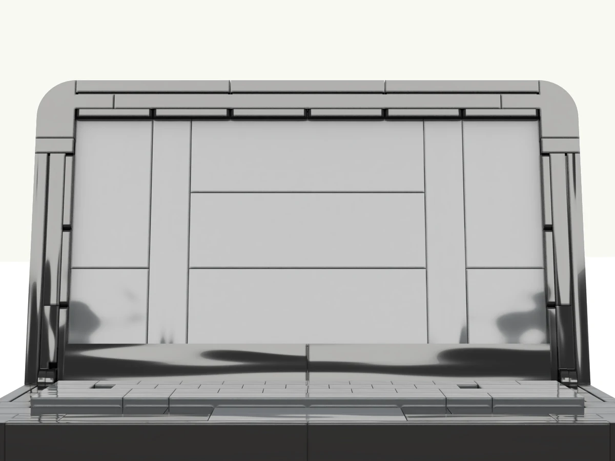 The laptop model at rest on its turntable, screen facing you