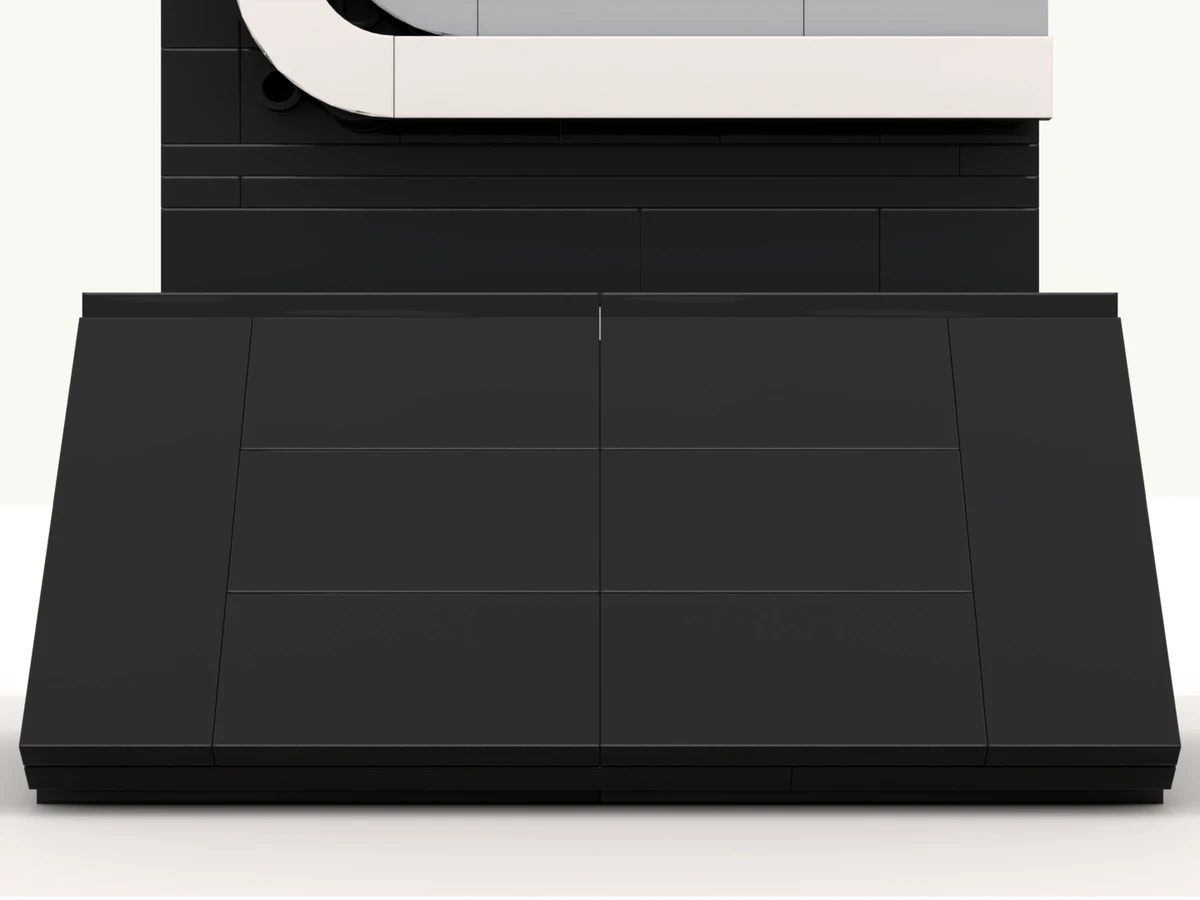 The loop deal toy at rest on its turntable, front facing you